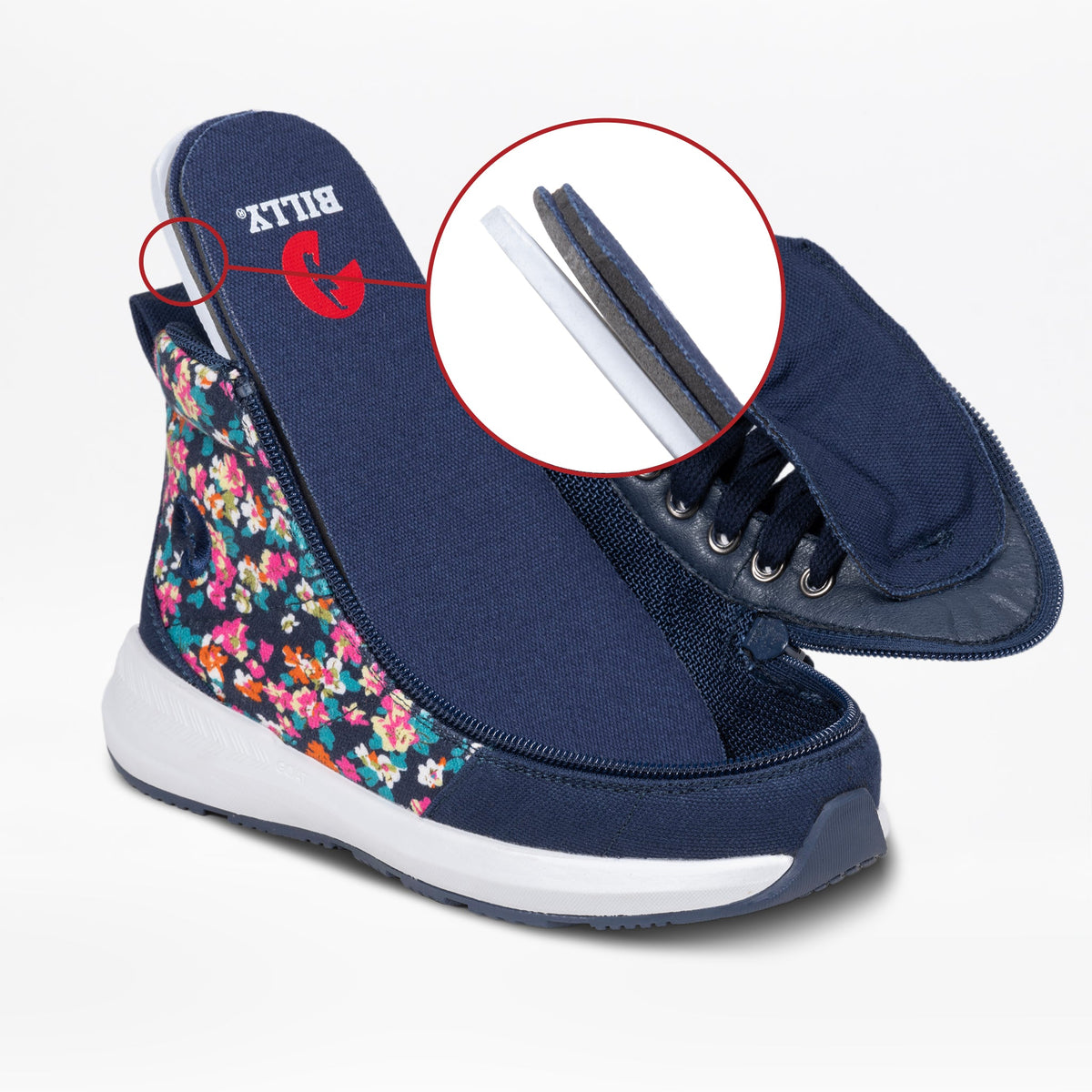 The Navy Floral BILLY Goat Classic High by BILLY Footwear is a kids’ adaptive shoe with a white sole and floral pattern, featuring a removable tongue shown in close-up to highlight its layered design for easy orthotic use.