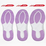 Three Lilac Watercolor BILLY Limitless soles from BILLY Footwear, in Medium, Wide, and Extra-Wide widths, are shown side by side to display the sensory-friendly shoe’s width options with purple and white treads.