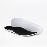 A pair of insoles for the Men's Taupe BILLY Inclusion Trail Boot by BILLY Footwear is pictured on a white background, with one insole flat and the other upright to show the black top and white bottom.